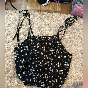 Small shein tie shoulder tank. is cropped.